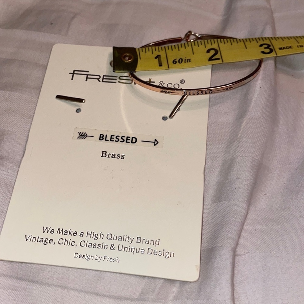 Blessed brass bangle